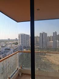 Invisible Grill Installation in Bavdhan, Pune | Balcony Safety for High-Rise Buildings